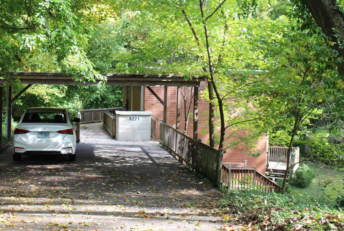 The Farthing home at 8221 W. Main St. in Belleville was built on a sunken lot and nestled in woods, making it barely visible from the road when trees are full of leaves