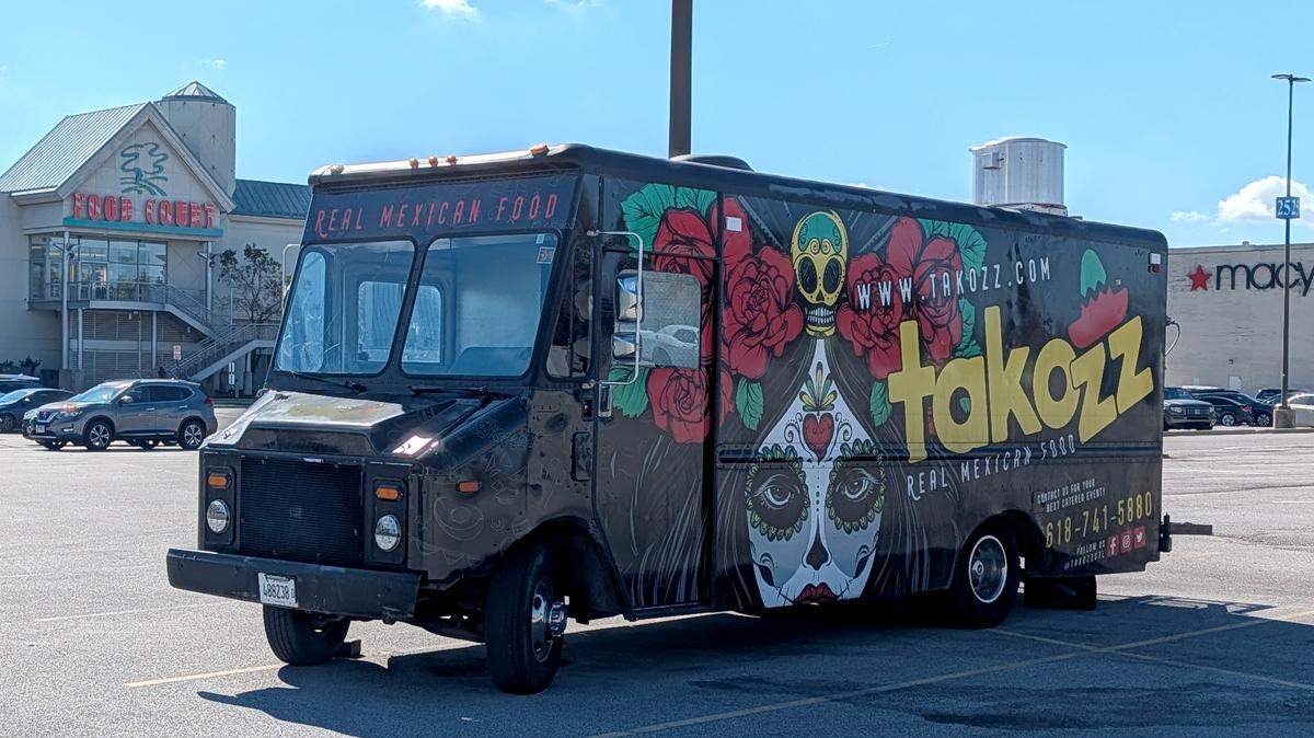 Takozz food trucks operate at St. Clair Square while the business prepares to open a new restaurant location.