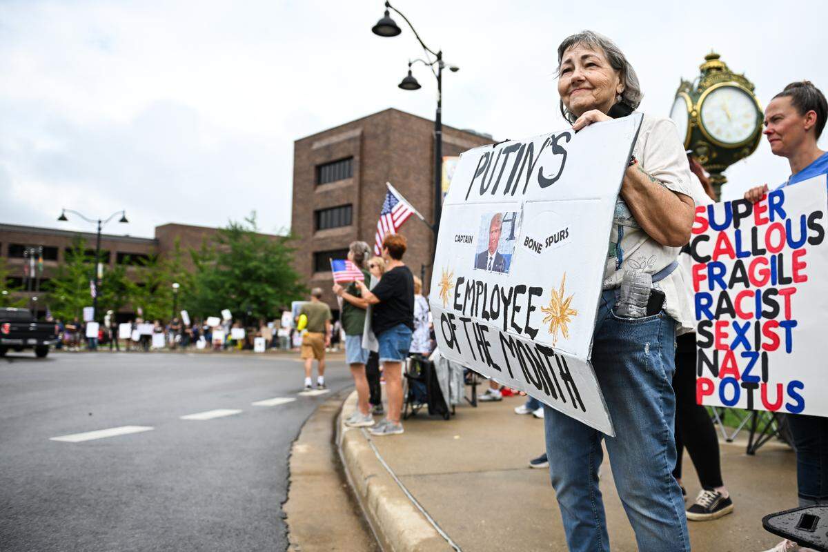 Protesters rally against President Donald Trump at the “No Kings” protest in Belleville’s Public Square Saturday, June 14, 2025.