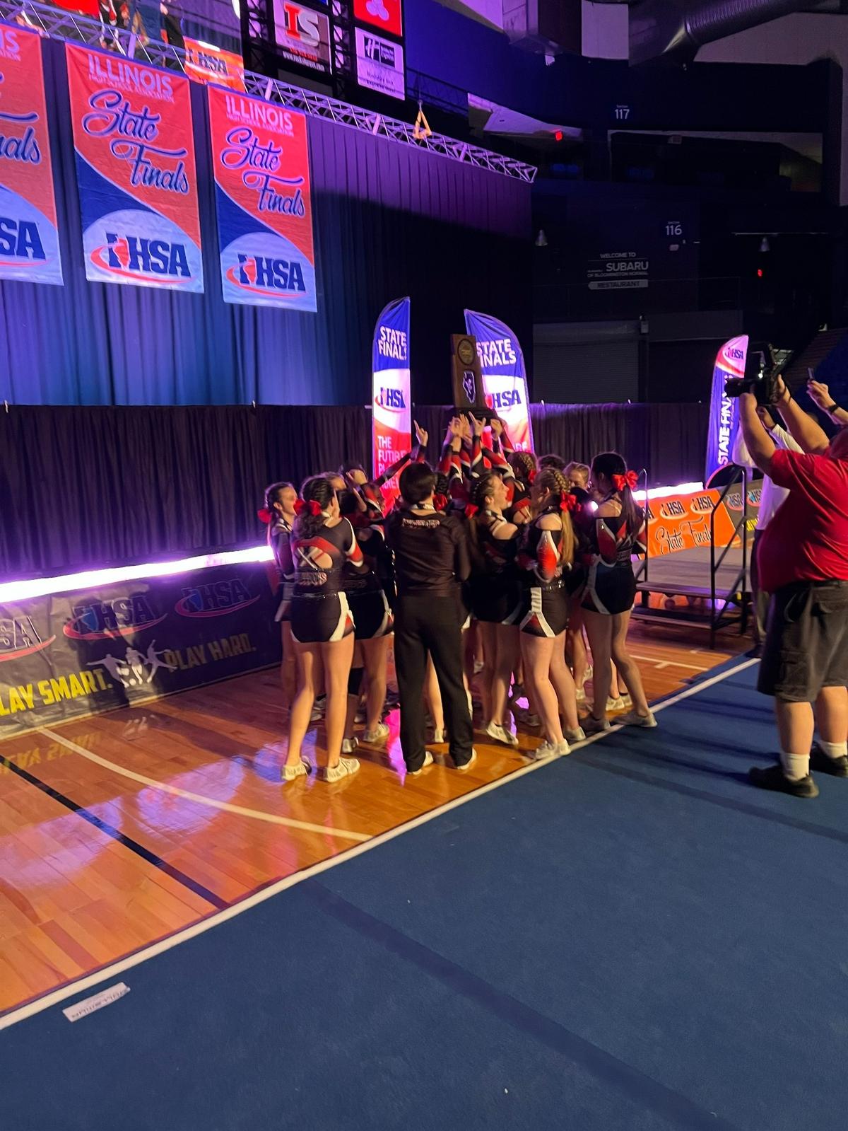The Highland High School coed cheer team captured the IHSA Coed State Title and Championship at the IHSA State Finals on Friday, Feb. 4, and Saturday, Feb. 5, in Bloomington.