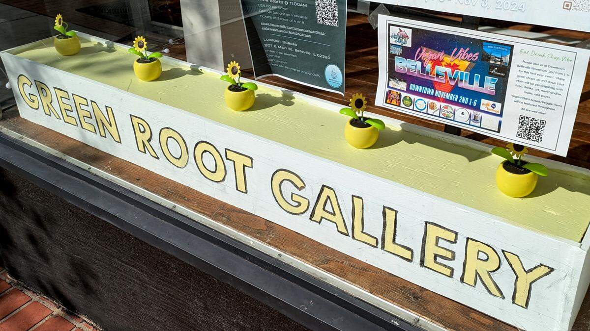 Green Root Gallery, one of the downtown Belleville businesses participating in the Vegan Vibes festival, displays the flyer for the inaugural event.