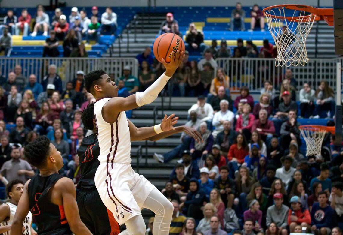 Belleville West’s Malachi Smith goes for a layup during Friday’s game.