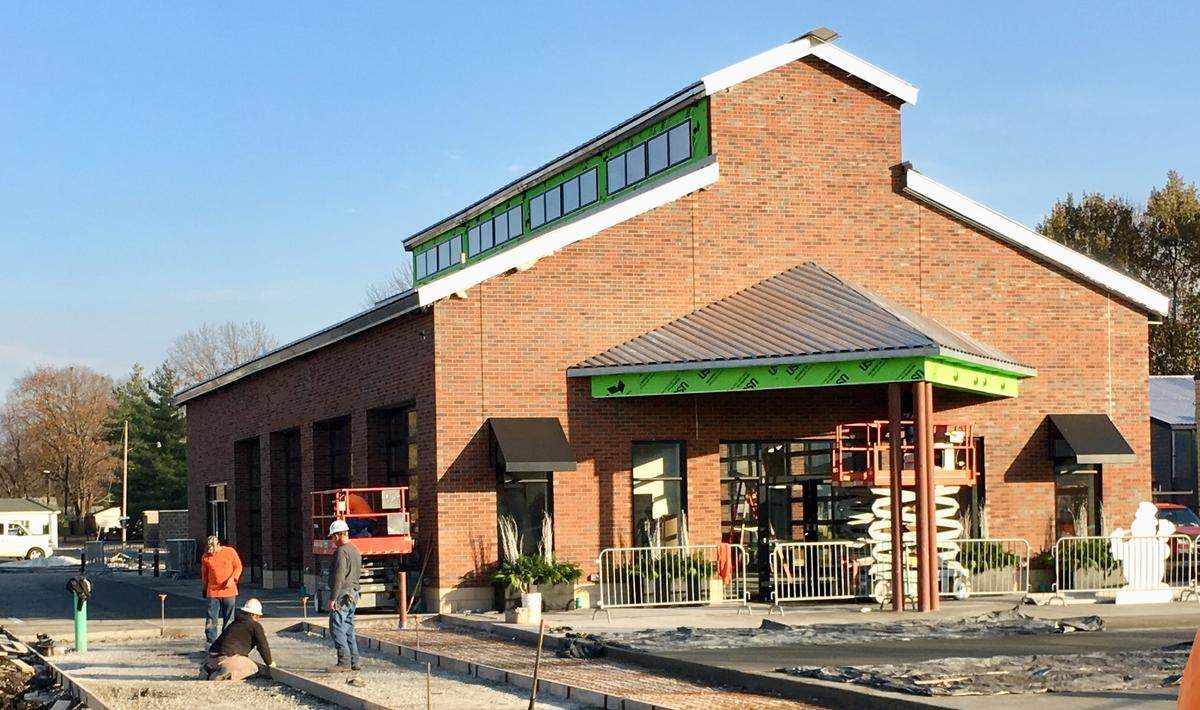 Workers near completion of the new O’Fallon Station and downtown pavilion.