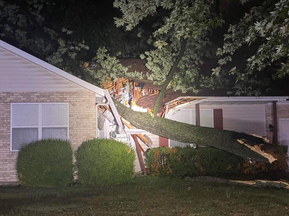 A large tree fell through the roof of a home on Judy Lane, essentially cutting it in half, during a severe thunderstorm Friday night. No injuries were reported.