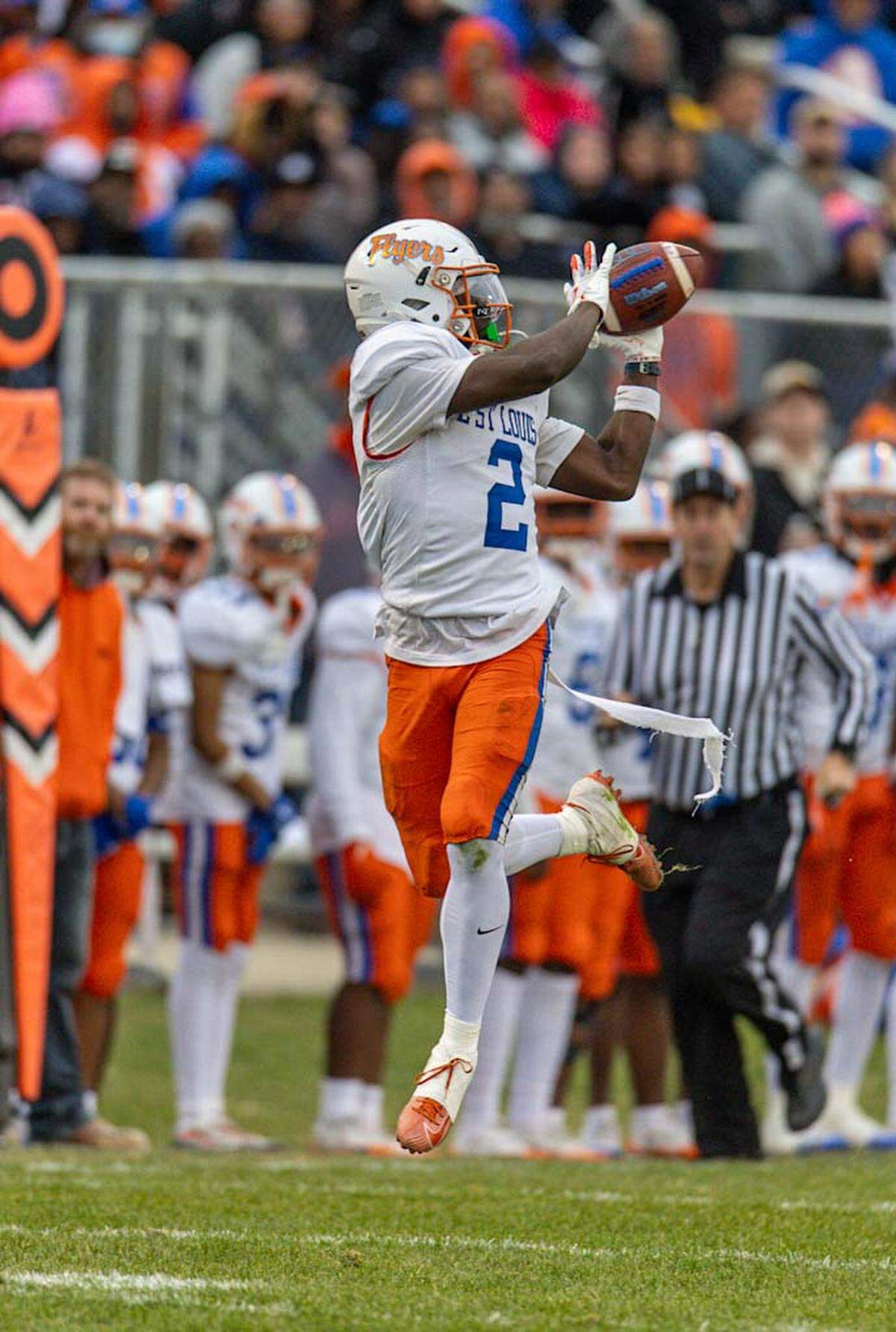 East St. Louis’ Ronnie Gomiller makes the catch during Saturday’s IHSA Class 6A second-round football playoff game against Glenwood.