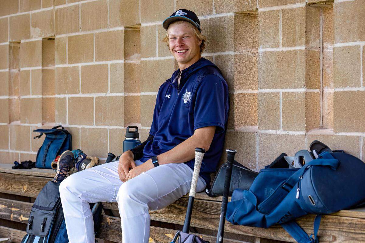 Belleville East pitcher Zander Mueth enjoys a moment of relaxation during practice Wednesday, May 17. Mueth is one of the key hurlers on a talented Lancers pitching staff.