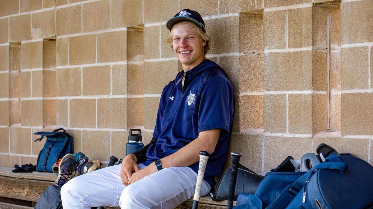 Belleville East pitcher Zander Mueth enjoys a moment of relaxation during practice this spring. Mueth was drafted in the second round of Sunday night’s Major League Baseball draft.