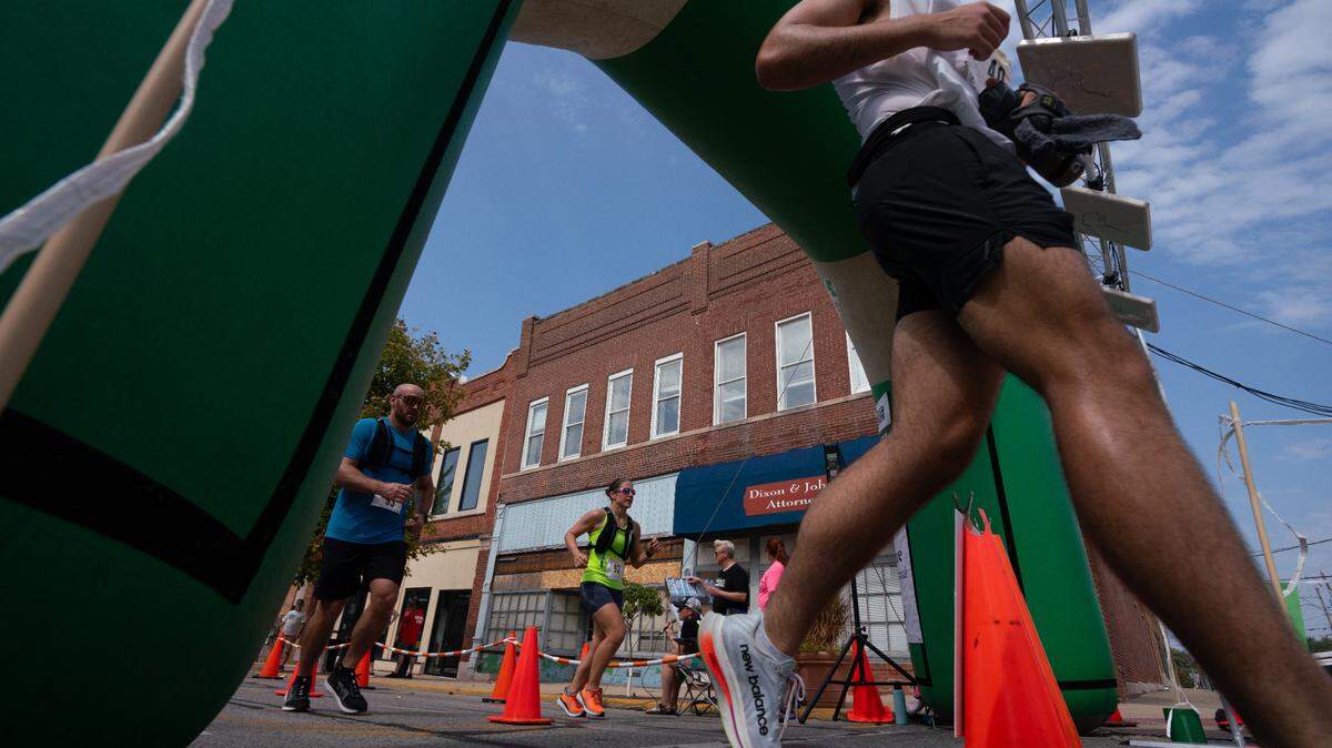 This file photo shows runners cross the finish line at the Belleville Main Street Marathon on Sept. 30, 2023. This year’s race starts at 7 a.m. Saturday.