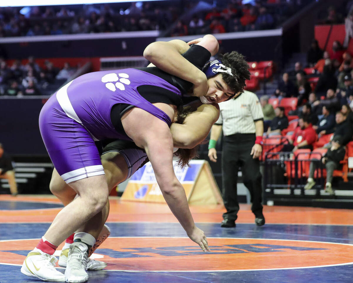 Belleville East freshman Jonathan Rulo wrestles Hampshire’s Joey Ochoa during their preliminary match at the 2023 IHSA Individual Wrestling State Finals on Thursday in Champaign. Rulo went on to score a win by fall at 5:48.
