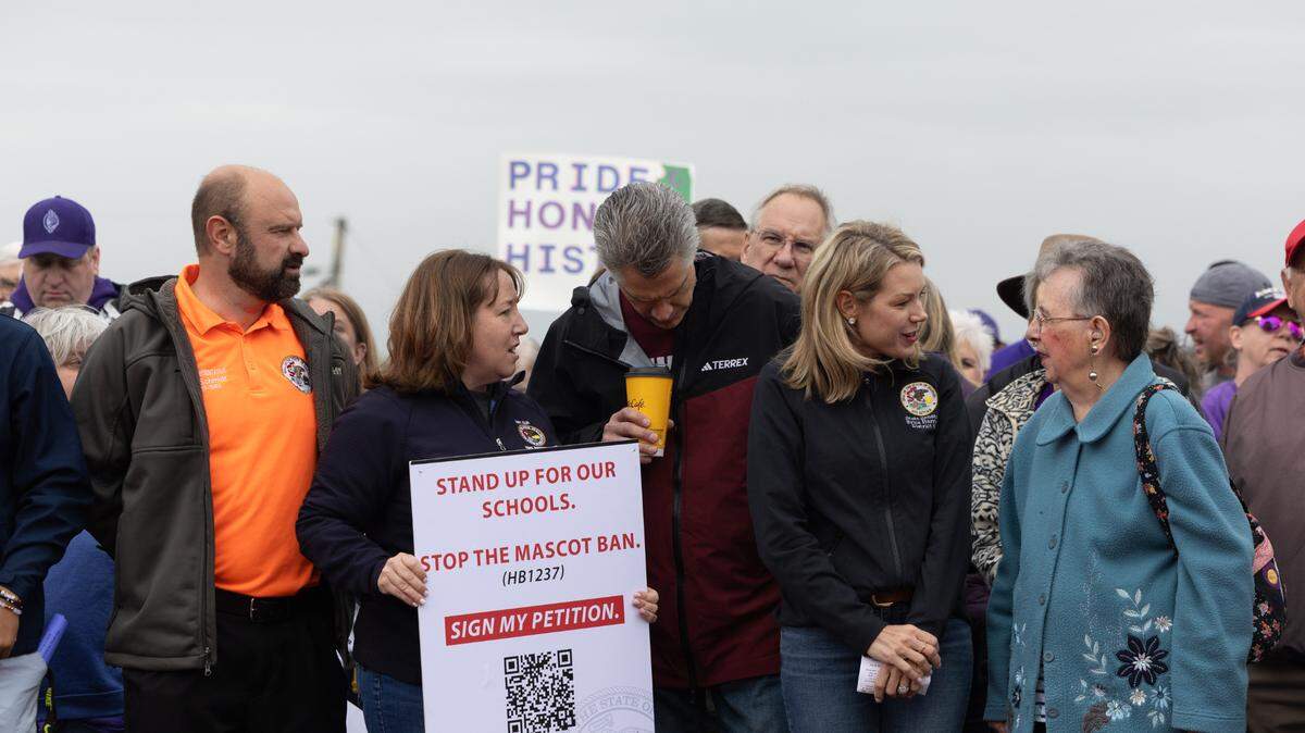 Illinois State Rep. Kevin Schmidt, Rep. Amy Elik, Rep. David Freiss and State Sen. Erica Harriss join a protest against the proposed ban on Native American mascots in Illinois.