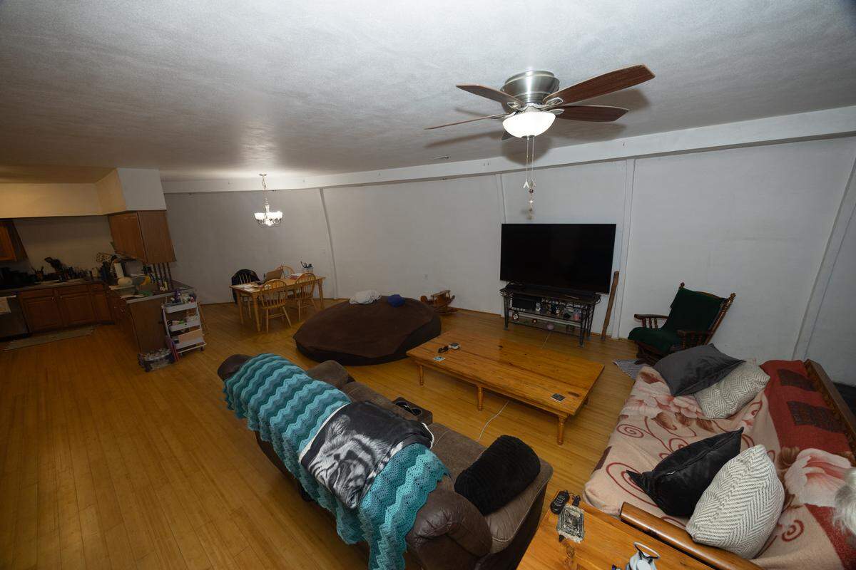 A large open-floor plan connects the spacious living room to the equally ample kitchen, bordered in by a curved wall as a result of the location’s dome shape.