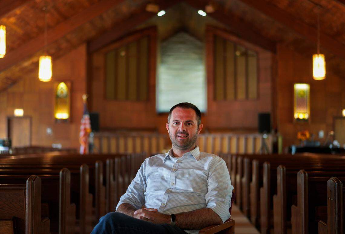 Pastor Ryan Burge, an associate professor of political science at Eastern Illinois University and author of “The Nones,” a book on the growing number of religiously unaffiliated Americans, poses for a portrait at at First Baptist Church in Mt. Vernon, Ill., Sunday, Sept. 10, 2023. (AP Photo/Jessie Wardarski)