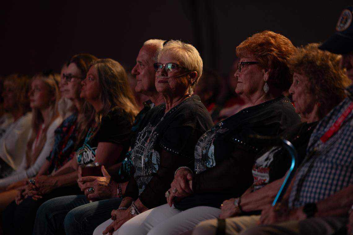Fans watch in admiration as Logan Ramey takes to the stage for his performance of 70s Elvis hits.