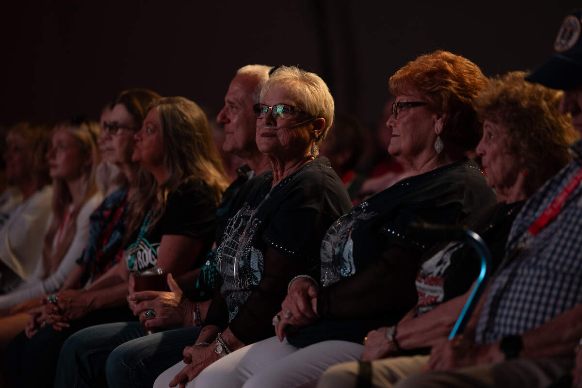 Fans watch in admiration as Logan Ramey takes to the stage for his performance of 70s Elvis hits.