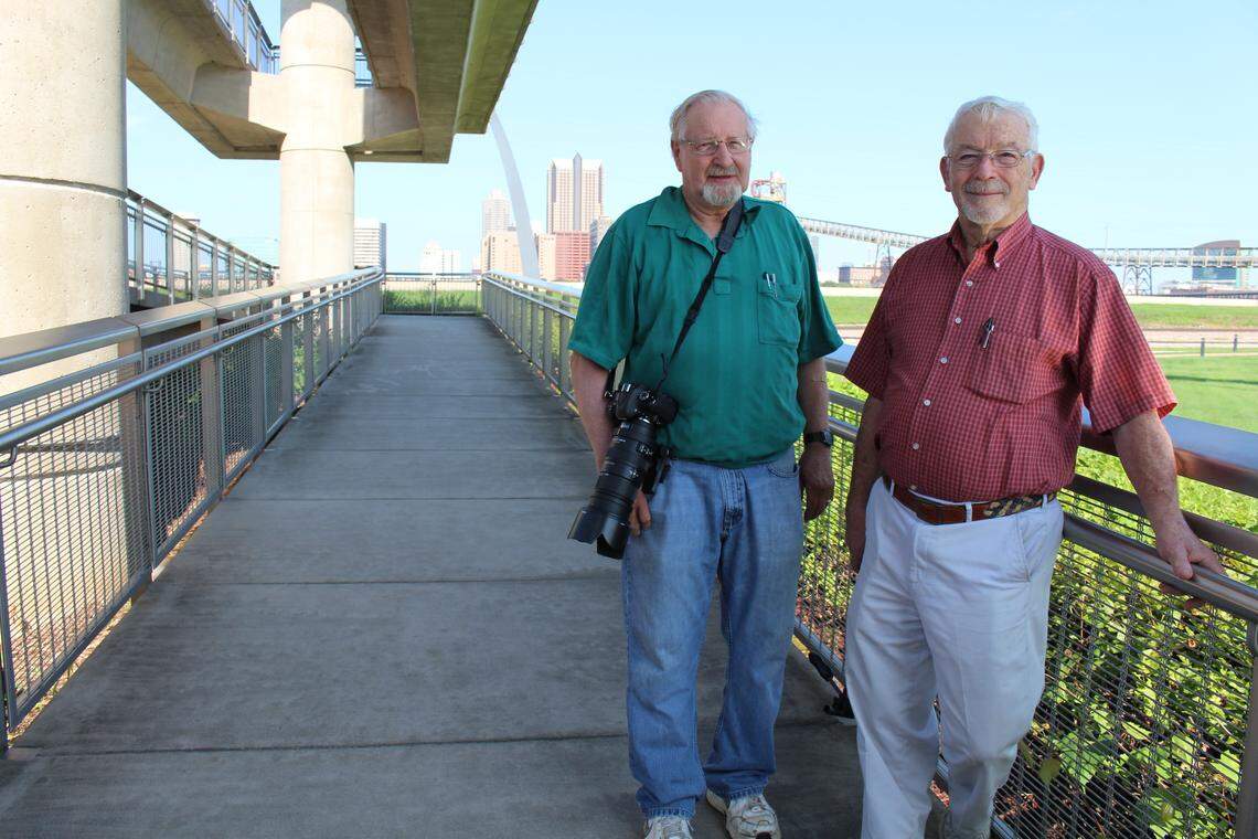 Photographer Robert Davis, of Winchester, Kentucky, wields a camera and giant zoom lens at Malcolm W. Martin Memorial Park in East St. Louis. He was visiting his friend, Jerry Fryer, in Fairview Heights.