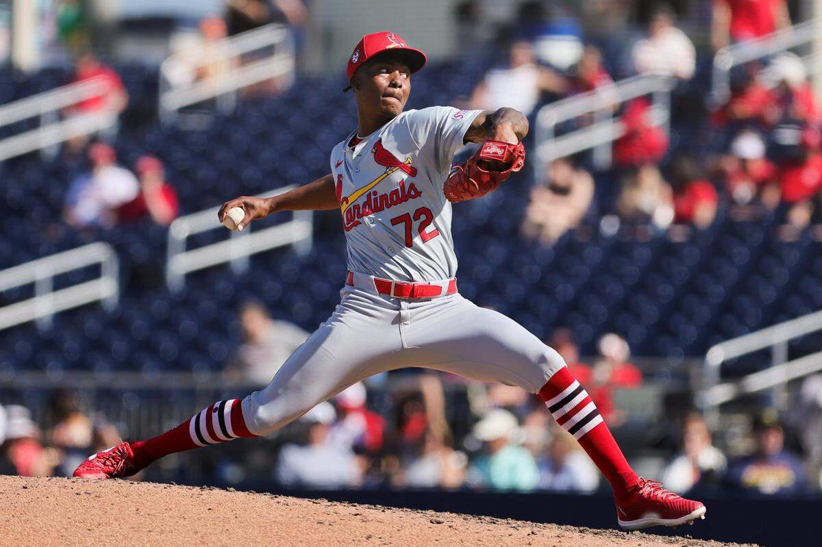 Feb 25, 2024; West Palm Beach, Florida, USA; St. Louis Cardinals relief pitcher Tink Hence (72) delivers a pitch against the Houston Astros during the seventh inning at CACTI Park of the Palm Beaches. Mandatory Credit: Sam Navarro-USA TODAY Sports