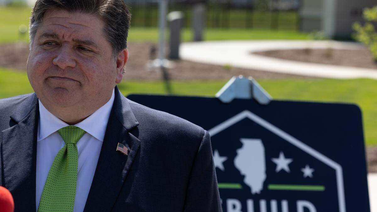 Gov. J.B. Pritzker attends a ribbon-cutting ceremony for a new $14.7 million administration building for Madison County Transit in Pontoon Beach Thursday. Funding for the building included $4.4 million from the Rebuild Illinois program, which was approved in 2019 and receives funding in part from a doubling of the state’s gas tax, an increase in the state’s cigarette tax and an increase in the state’s license plate renewal fee.