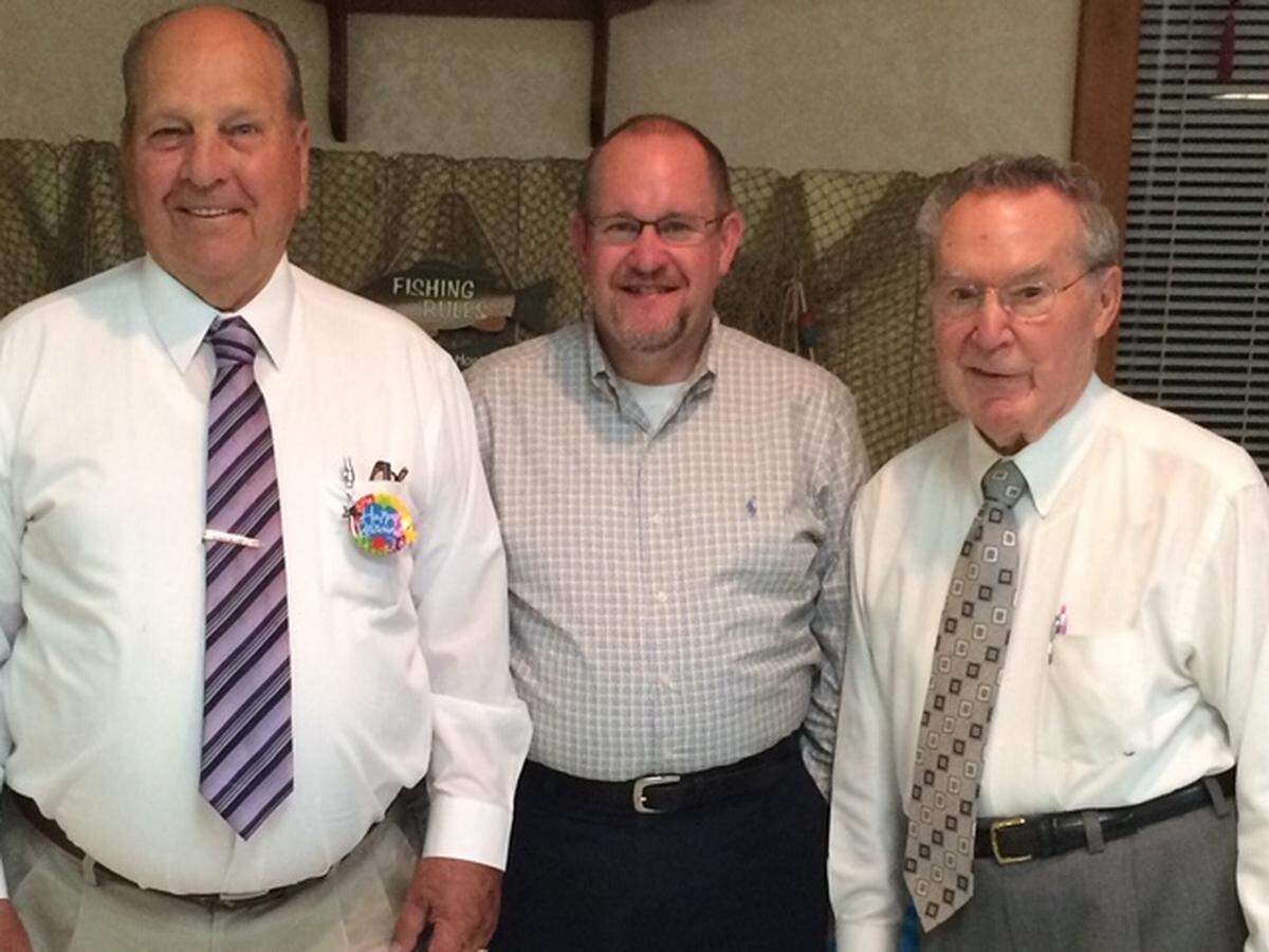 Three of four Fairview Heights mayors pose for a photo. They are, left to right, Gail Mitchell, the city’s third and longest-serving mayor; current Mayor Mark Kupsky; and the second mayor, George Lanxon. Not pictured is the late Everett Moody.