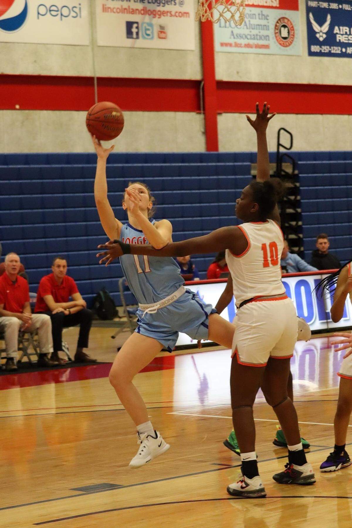 Lincoln Land guard Kirsten Taylor goes up for a shot during a regular season game last year during her freshman season with the Loggers. A Highland High School graduate, Taylor played in 29 games last season while averaging 4.6 points per contest.