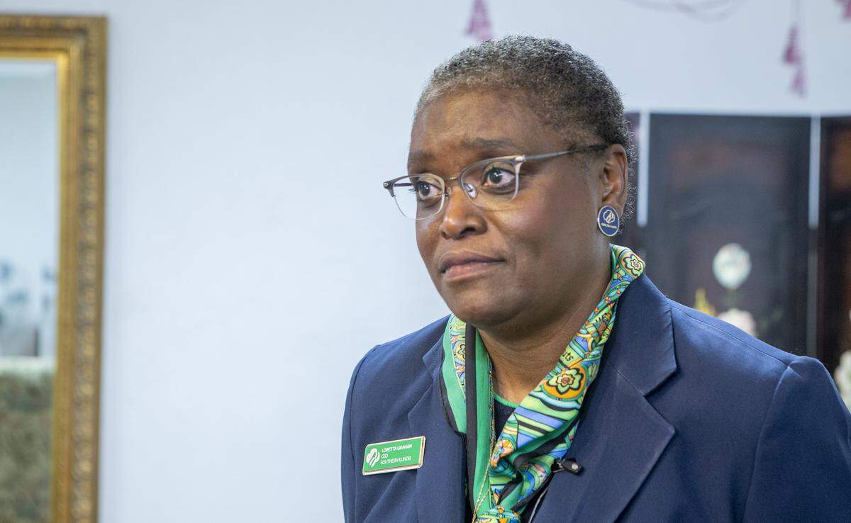 Girl Scouts of Southern Illinois CEO Loretta Graham listens to a reporter’s question during a break from a town hall meeting at St. Matthew United Methodist Church in Belleville on March 5, 2020.
