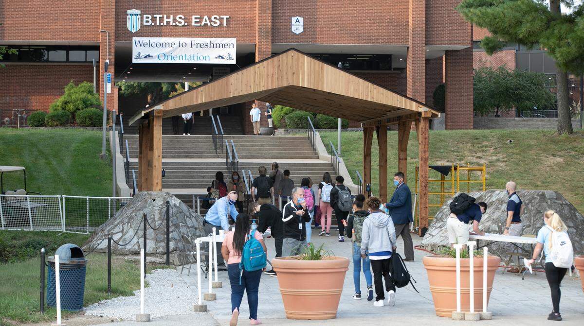 Half of the freshman class at Belleville Township High School East arrive on campus Thursday morning for their orientation day. District 201, which includes Belleville East and West high schools started a modified schedule to return students to the classroom during the coronavirus pandemic.
