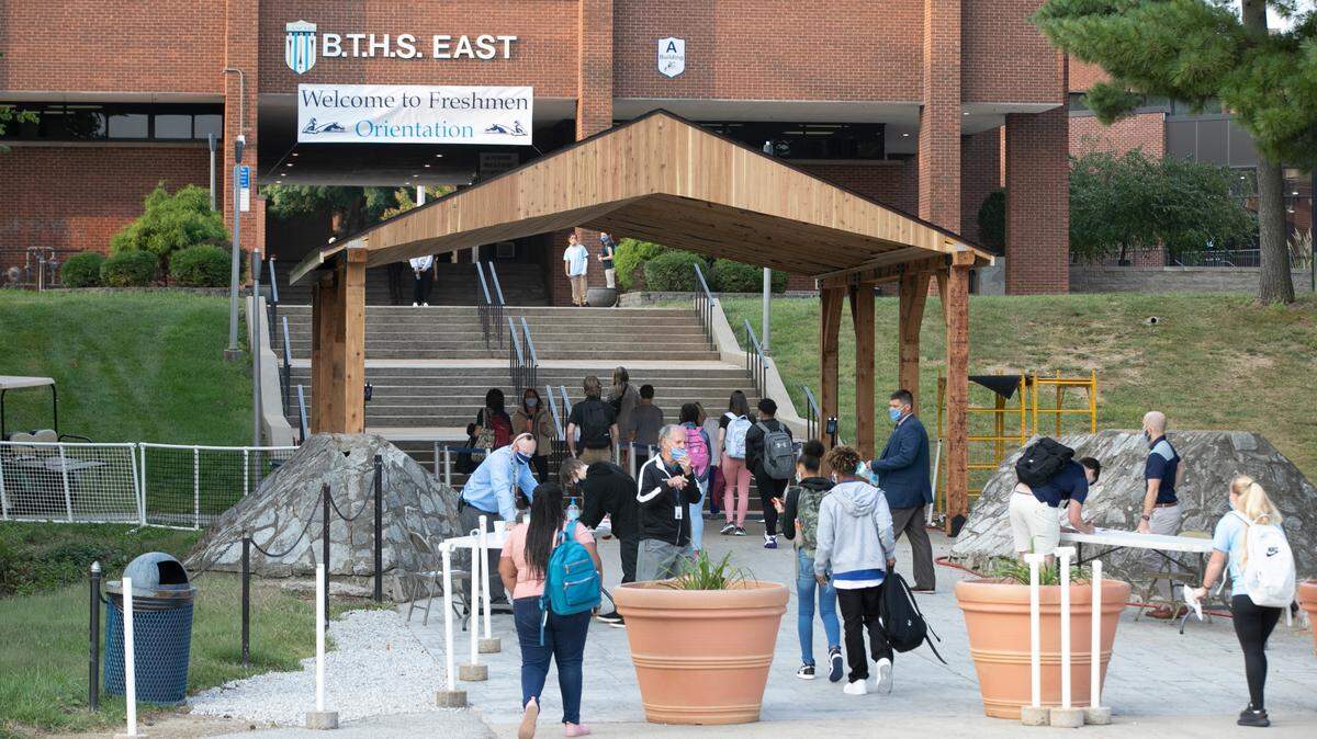 Half of the freshman class at Belleville East High School arrive on campus for their orientation day in September 2020. District 201 started a modified schedule to return students to the classroom during the COVID-19 pandemic.
