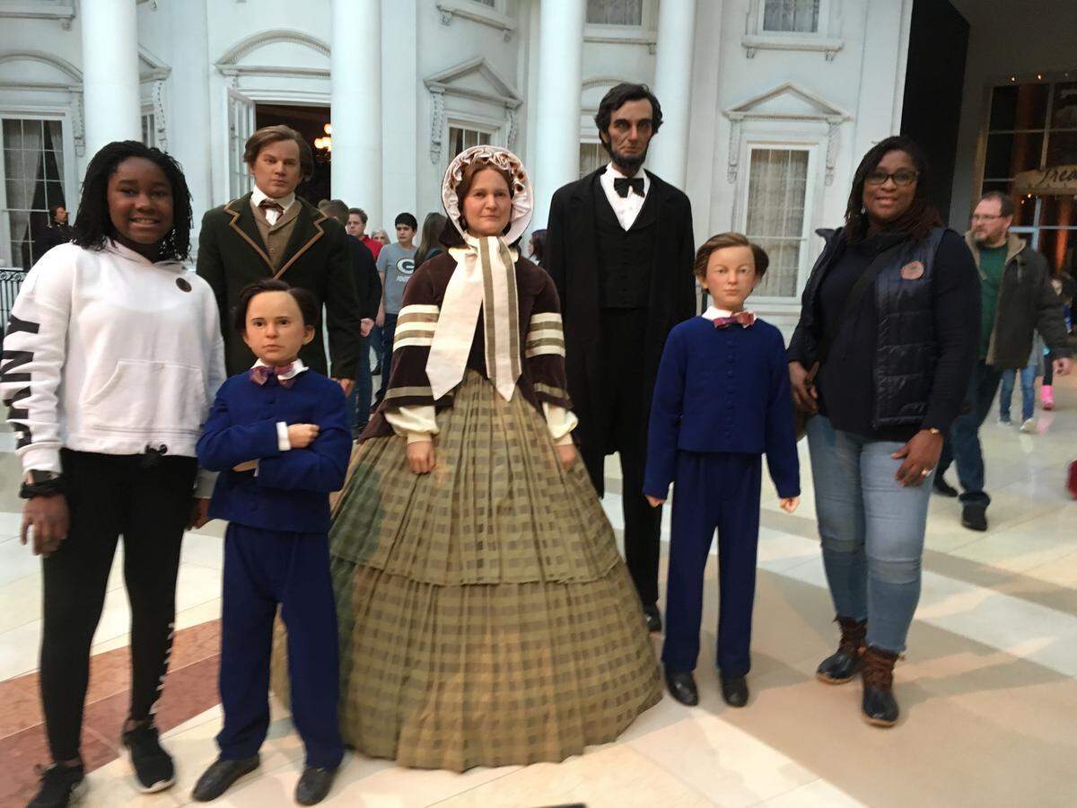 It’s become a tradition for visitors to pose with Lincoln cutouts at the museum. Jadyn Scott and her mom Justina Scott-Hayes of Chatham, Illinois, take their turn.