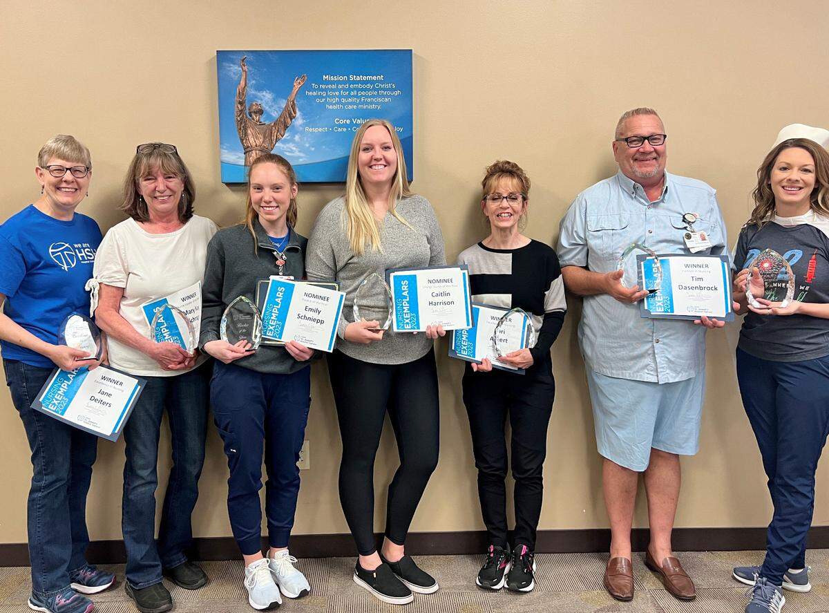 Interim CEO and CNO, Teresa Cornelius presented the Nurse Exemplar awards to the recipients. Pictured from left to right: Jane Deiters, RN; Mary Kay Schrage, RN; Emily Schniepp, RN; Caitlin Harrison, RN; Lori Albert, RN; Tim Dasenbrock, floor care specialist; and Interim CEO and CNO, Teresa Cornelius. Not pictured: Kathryn Thole, RN.