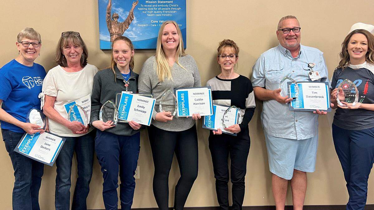 Interim CEO and CNO, Teresa Cornelius presented the Nurse Exemplar awards to the recipients. Pictured from left to right: Jane Deiters, RN; Mary Kay Schrage, RN; Emily Schniepp, RN; Caitlin Harrison, RN; Lori Albert, RN; Tim Dasenbrock, floor care specialist; and Interim CEO and CNO, Teresa Cornelius. Not pictured: Kathryn Thole, RN.