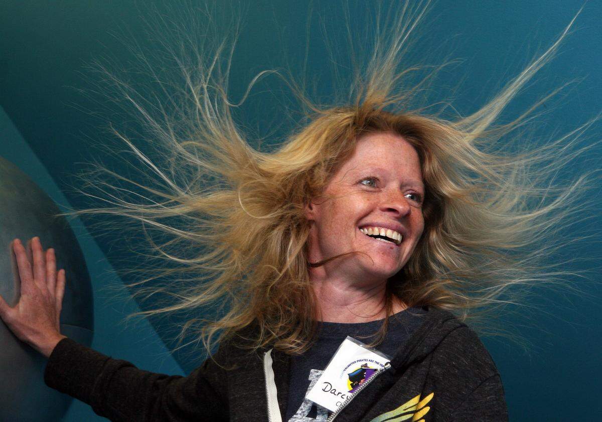 The electrostaic ball at the Magic House will make your hair stand out. There are fun activities for both kids and adults.