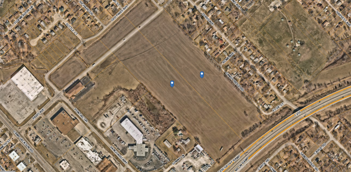 SIHF Healthcare purchased 35 acres of Cahokia Heights farmland for $1.3 million on Dec. 15, 2023. The land is located behind the Camp Jackson Road Schnucks shown in the bottom left corner of this map. The two large parcels of farmland are identified with blue markers. They extend across the street on Paris Avenue.