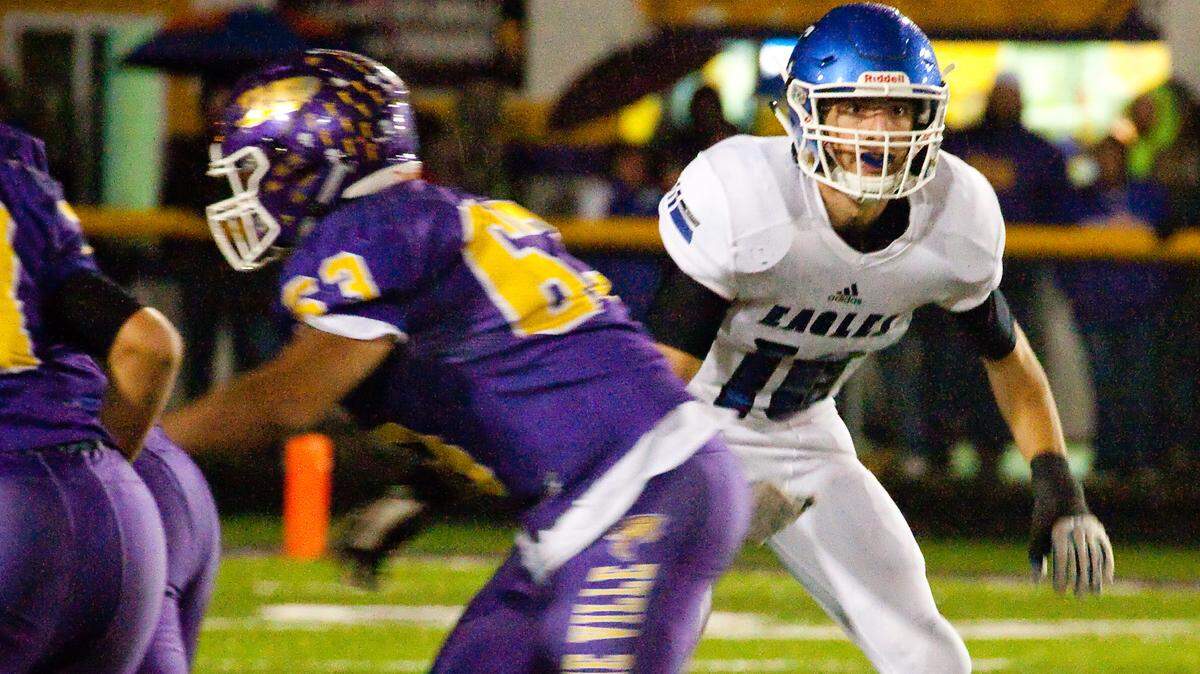 Columbia defensive end Matt Muehlher lines up in the Eagles loss to Taylorville in the Class 4A playoffs