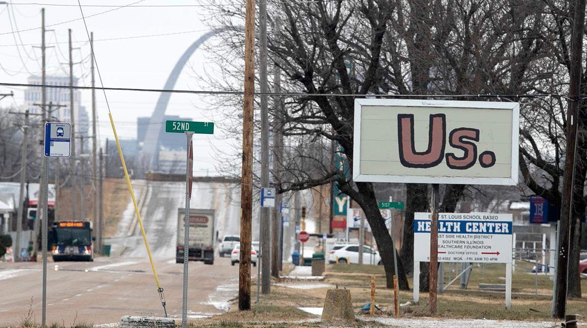 Members of Clean City Coalition have painted many abandoned signs in East St. Louis. The group is bringing residents together to clean up the city.