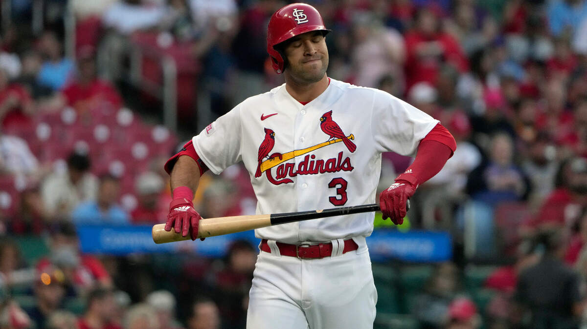 St. Louis Cardinals’ Dylan Carlson heads back to the dugout after striking out looking during the fifth inning of a baseball game against the San Francisco Giants Monday, June 12, 2023, in St. Louis. (AP Photo/Jeff Roberson)