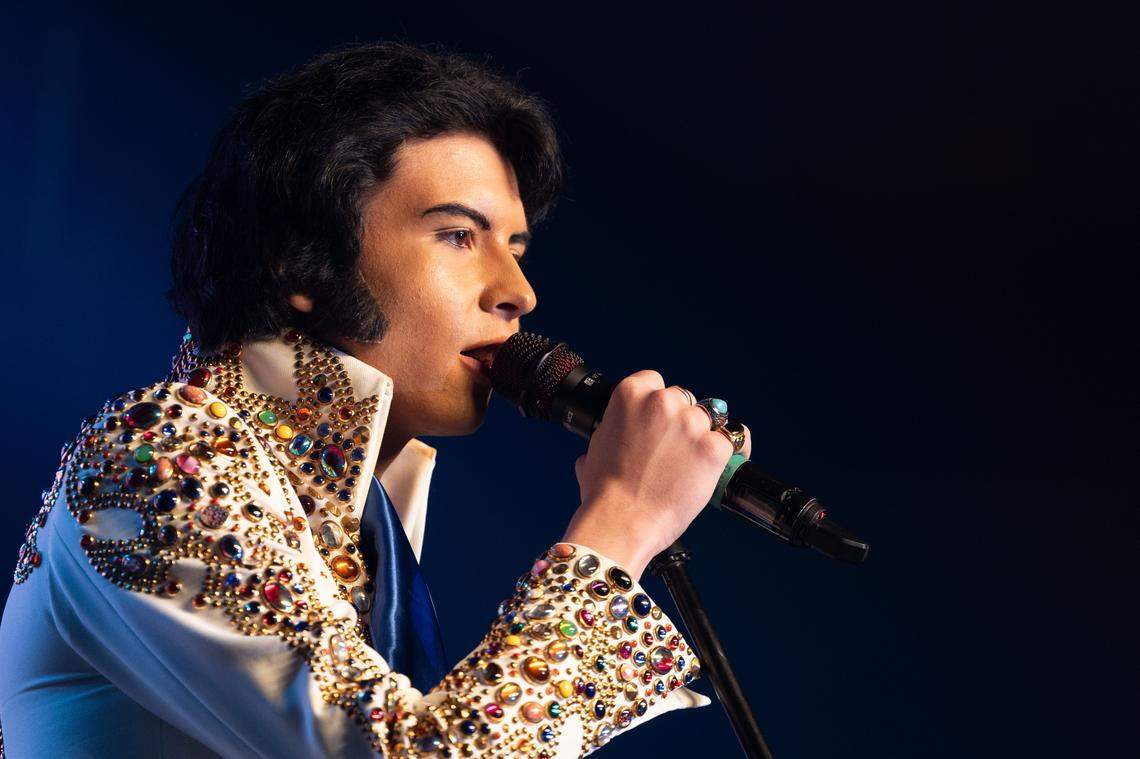 Washington-based Elvis tribute actor Logan Ramey performs slower Elvis ballads during the first night of the Elvis convention in Collinsville.