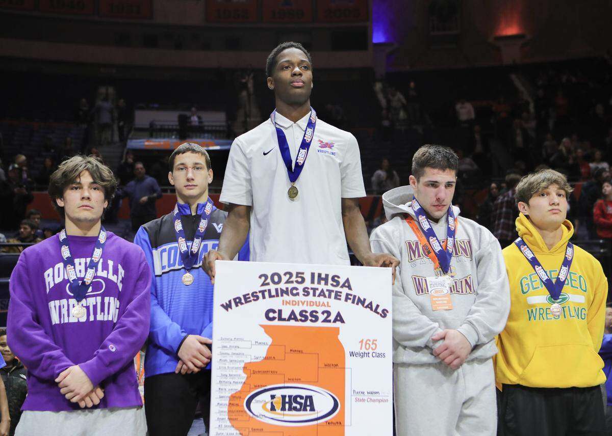 East St. Louis’s Pierre Walton brought home gold in the Class 2A 165-pound class at the IHSA Individual Wrestling State Finals on Saturday.