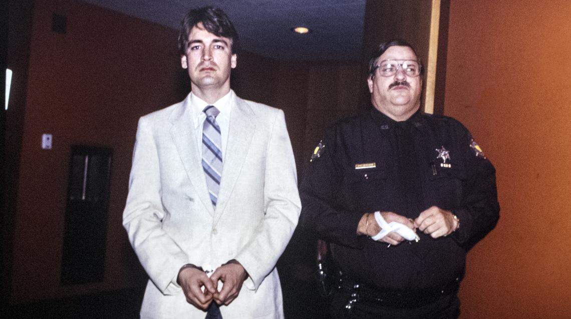 This file photo shows Timothy Hayden as he exits the courtroom during his trial for murder in 1991. He was found guilty of murdering his wife, Tracy Hayden. Tracy Hayden was 29 and the mother of two small children on July 27, 1990, when she was fatally stabbed by her estranged husband in a crowded west Belleville tavern.