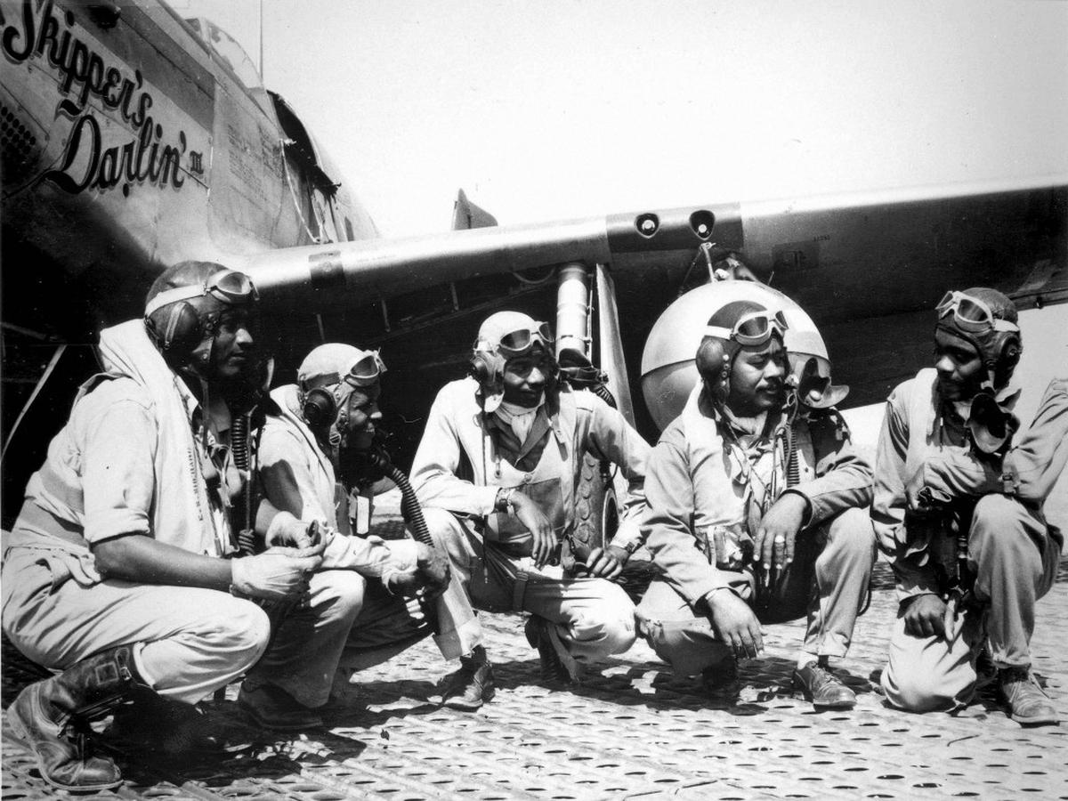 SCOTT FIELD RADIO SCHOOL TRAINED TUSKEGEE AIRMEN: The Tuskegee Airmen were a group of primarily African-American military pilots (fighter and bomber) and support Airmen who fought in World War II. They proved African-American Airmen could excel in combat if given an opportunity and helped open the door for the desegregation of the U.S. Armed Forces by President Harry S. Truman’s Executive Order in 1948.
