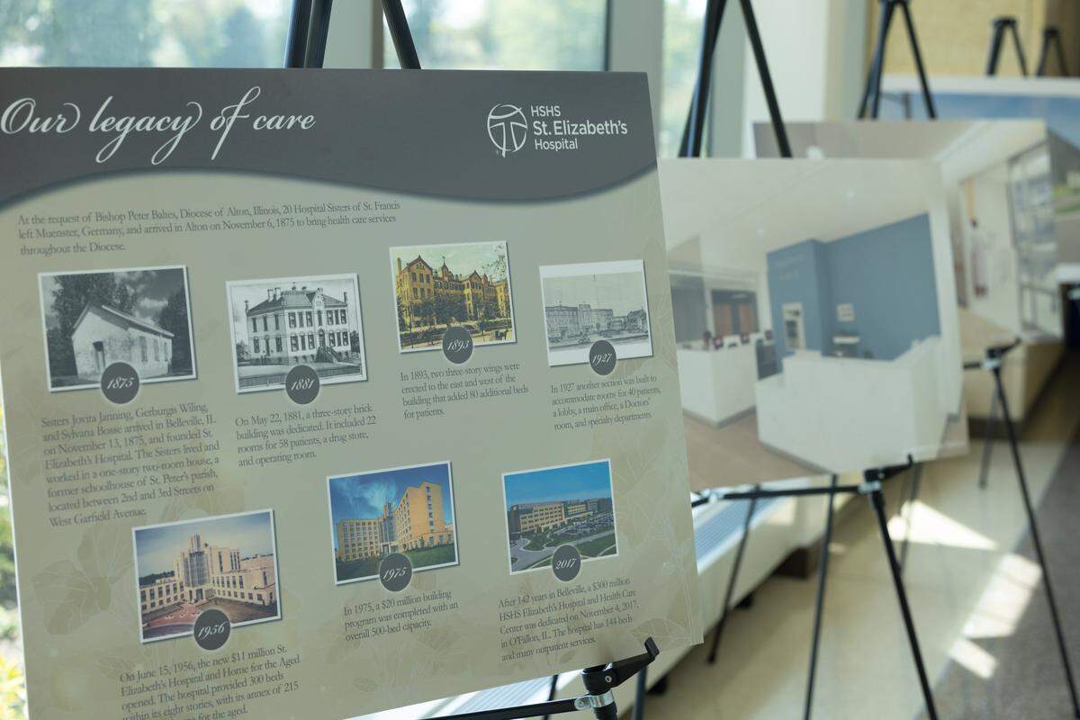 A diagram showing the history of HSHS St. Elizabeth’s hospital, as well as artist renderings on what the finished expansion will look like.