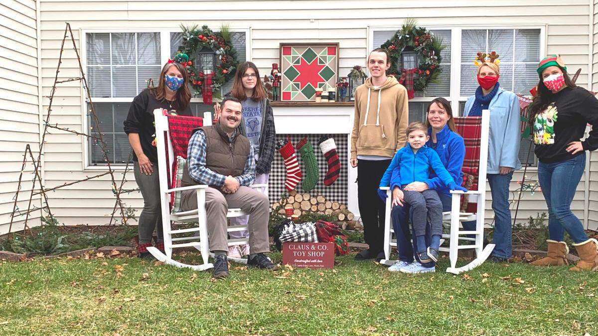 As volunteers in the national non-profit group, Moving with the Military, Jessica Manfre and Alicia Steele of O’Fallon spearheaded an elf team who transformed the home of the Brandon and Robin Bentley family, pictured, on Scott Air Force Base with a front yard makeover that had a country Christmas theme.