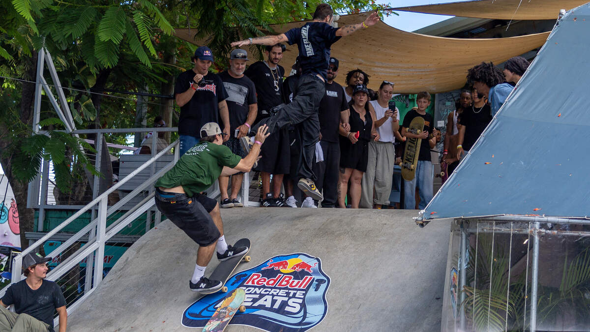Dillon Brown and Theo Marquez race toward the finish line during a head-to-head heat at SkateBird Miami in Miami, Fla., on Sunday, June 21, 2026, with Marquez losing his board just before the line.
