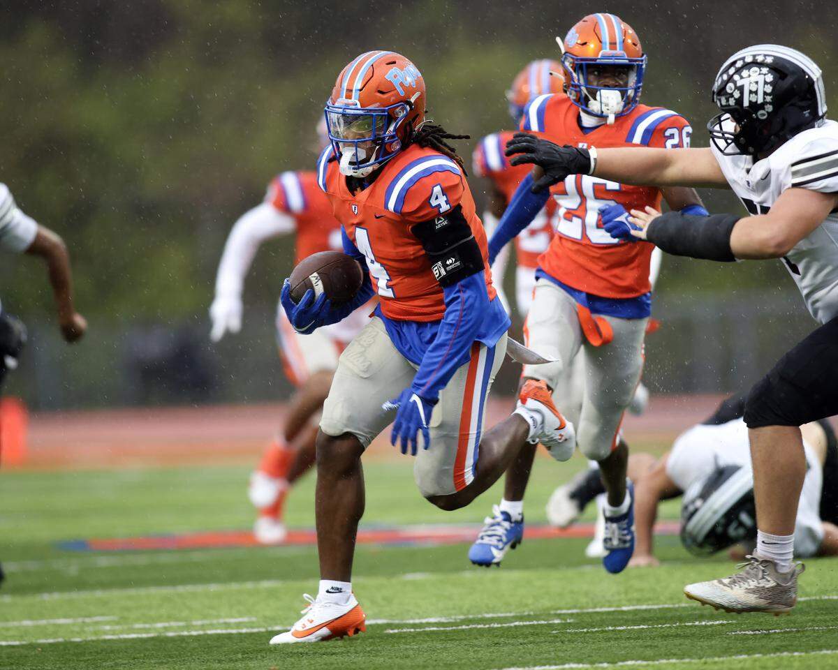 November 9, 2024 - East St. Louis Il, - East St. Louis Mekhi Mixon (4) returns an interception during SaturdayÕs IHSA 6A, second round game between East St.Louis and Normal West. The FlyersÕ 48-0 win advances them to the quarter round game where they will face Chatham (Glenwood). [Photo: Chris Johns]
