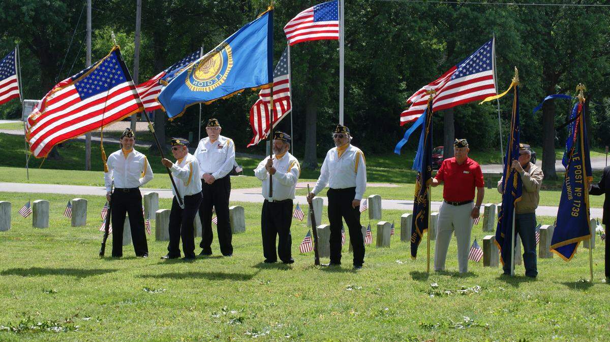 This file photo shows a color guard at the Memorial Day ceremony at Walnut Hill Cemetery in Belleville in 2021.
