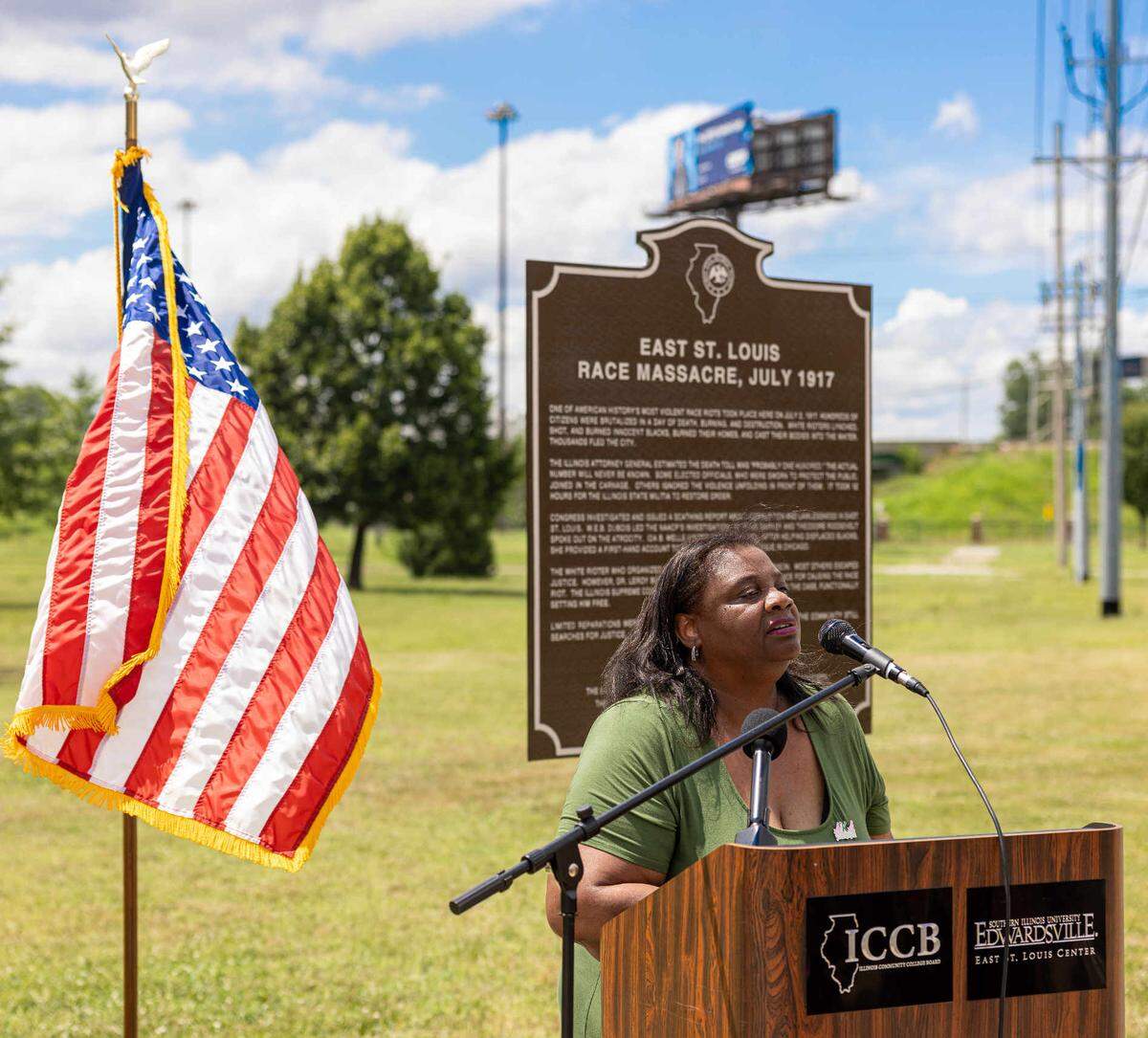 Jaye P. Willis, executive director of the East St. Louis Historical Society, speaks Sunday during the dedication of a marker commemorating the 1917 East St. Louis Race Massacre. The marker is at Southern Illinois University Edwardsville’s East St. Louis campus. The worst violence was on July 2, 1917, when Black men, women and children were attacked by mobs of angry white people. Thirty-nine Black people and 8 white people were killed, according to the official count, though the NAACP and others estimated between 100 and 200 Black people lost their lives.