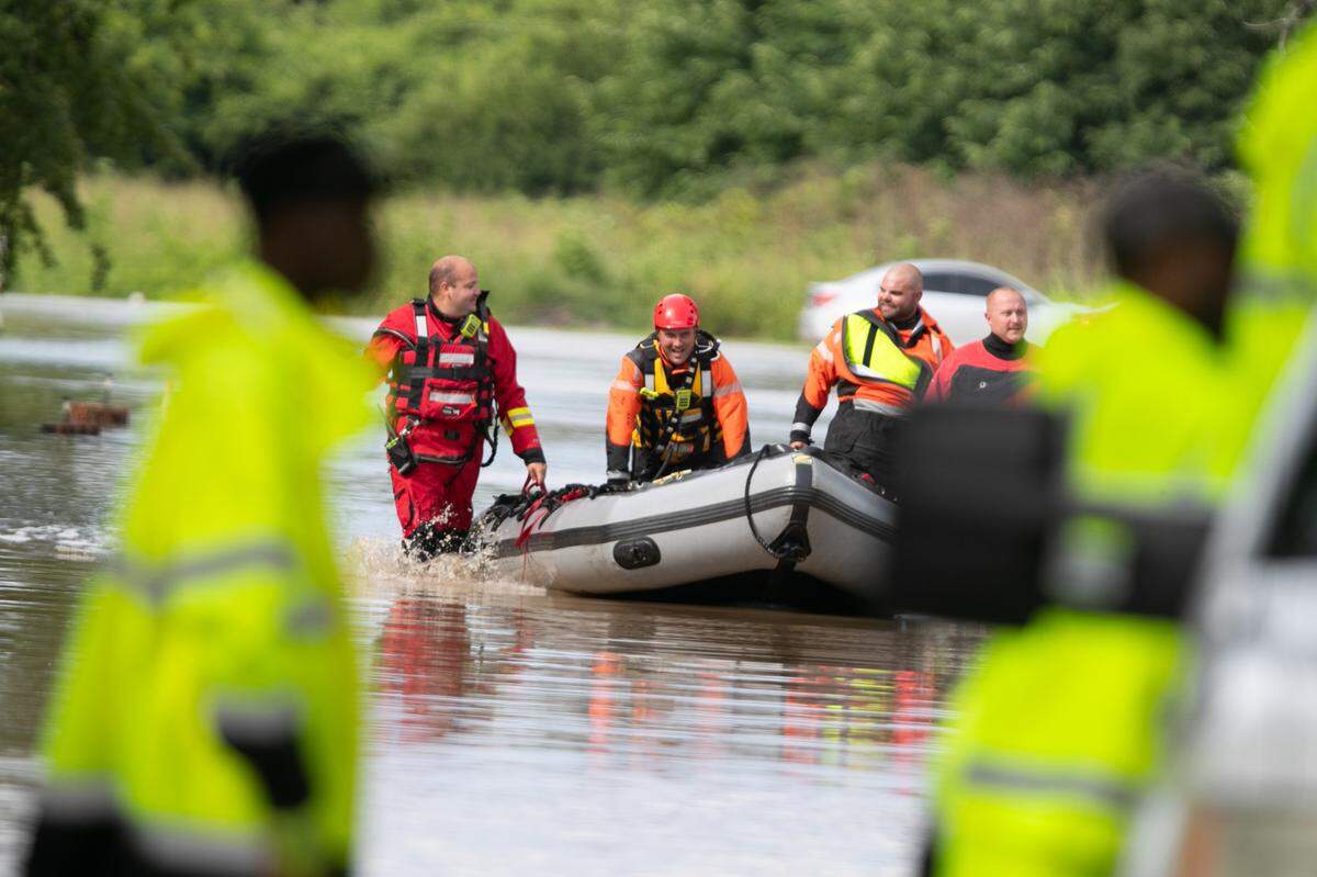 Rescue crews conduct operations after flooding inundated N. 47th St. in Cahokia Heights, Ill. on July 16, 2024