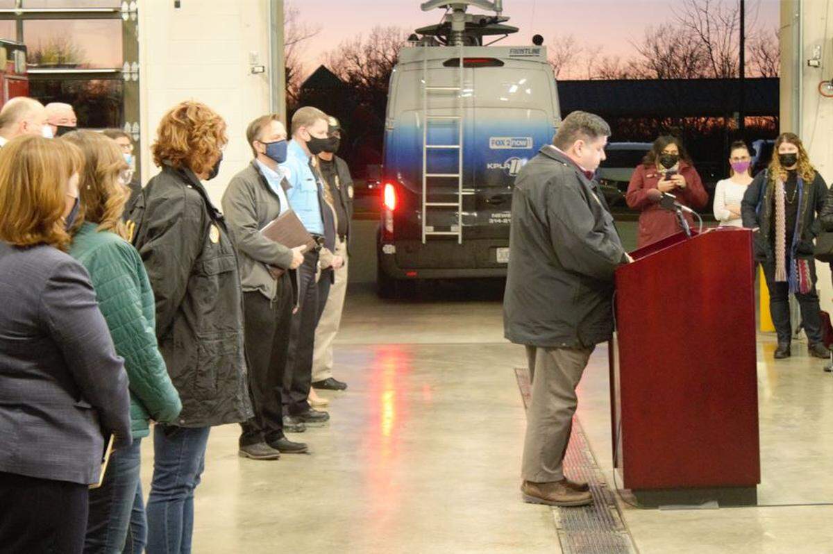 Gov. J.B. Pritzker speaks at a news conference in Edwardsville Saturday afternoon following the collapse of an Amazon warehouse that killed at least six people Friday.