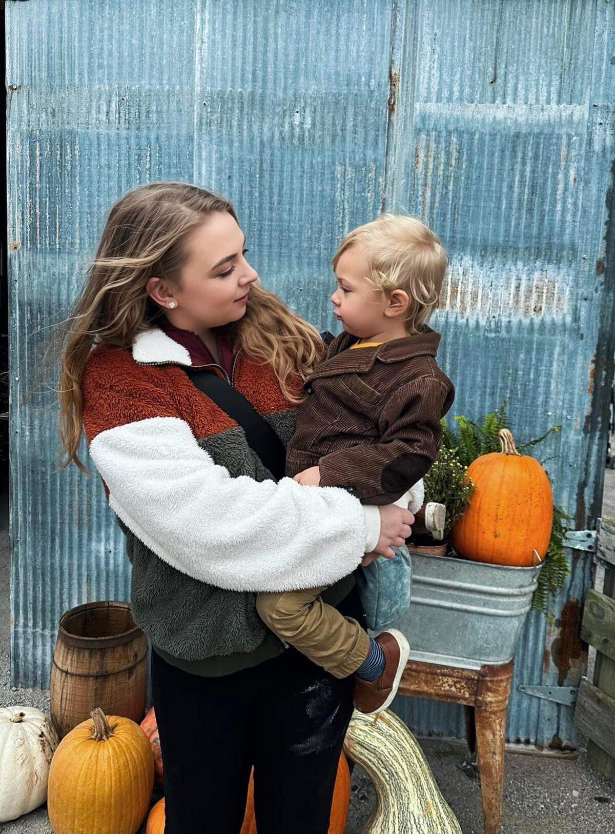 Karlie Langley, 27, who died in a three-vehicle crash in Swansea on May 2, with her son, Ryett.