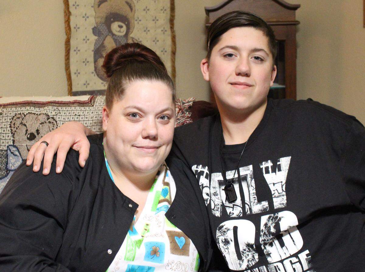 Carrie Lin Sanders is shown with her son, Jasin Denis Sanders, who is proud of his mother for trying to spread a little holiday cheer in Troy.