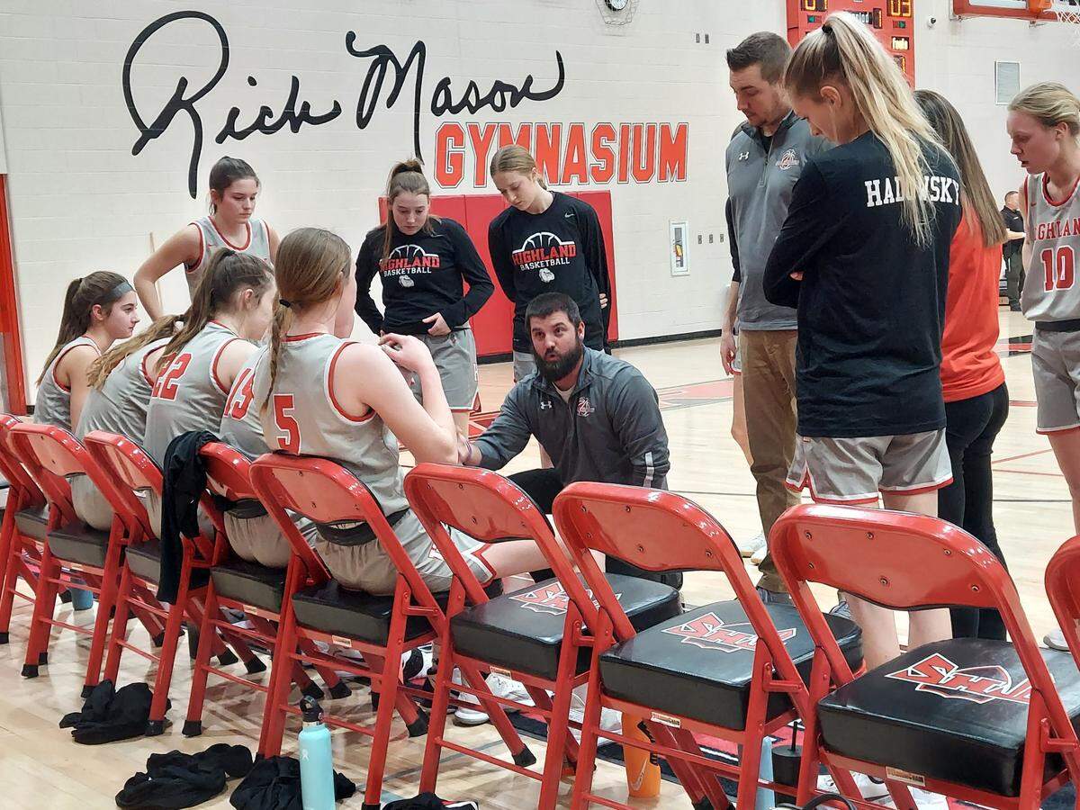 Highland girls basketball coach Clint Hamilton gives instructions to his team during the IHSA Class 3A Triad Regional semifinals last season. The Bulldogs had a tough 2021-22 campaign but return four starters from last year’s team and will again look to make some waves in the Mississippi Valley Conference standings.