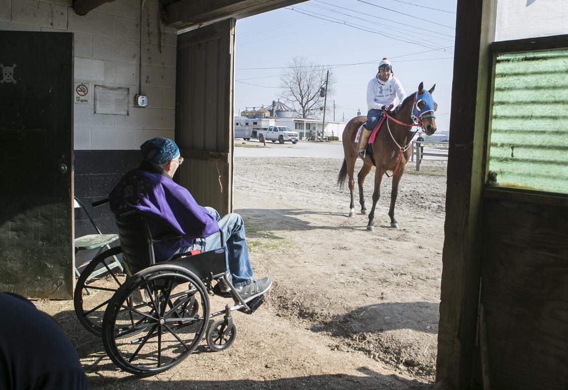 A trainer stops to say hi to his friend John Brown.  Brown, with the help of Unity Hospice, visited Fairmount Park where he was a horse trainer for years. Brown, 60, is a lifelong horseman, working as a trainer and a groom and in any other capacity he could find around horses since he was a child.  For decades he worked at Fairmount Racetrack in Collinsville, caring for and training racehorses.